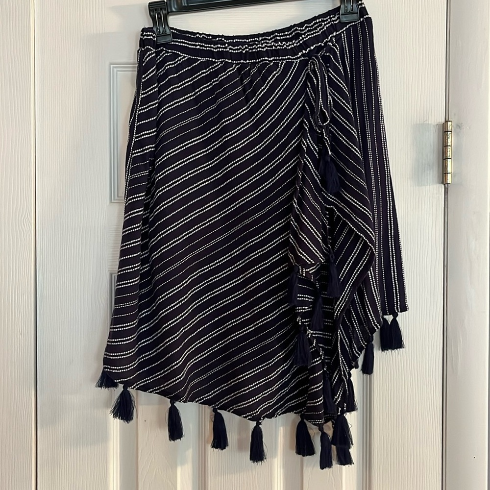 Aerie navy blue wrap skirt with white stripes and tassels. Women’s size medium.